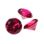 THREE LOOSE RUBY STONES