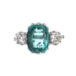 18CT WHITE GOLD EMERALD AND DIAMOND THREE STONE RING