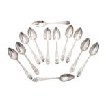 SET OF TWELVE SILVER SOUP SPOONS