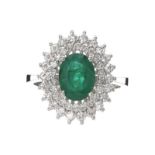 18CT WHITE GOLD EMERALD AND DIAMOND RING