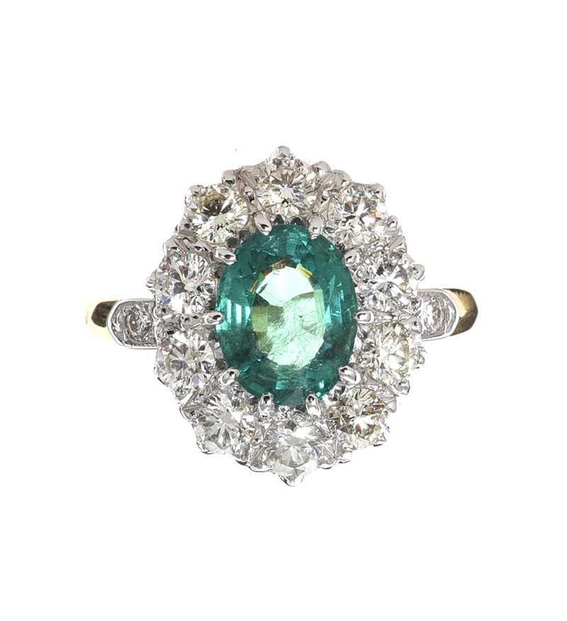 18CT GOLD EMERALD AND DIAMOND RING