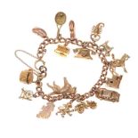 9CT GOLD CHARM BRACELET