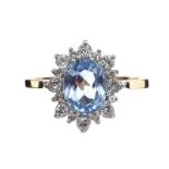 9CT GOLD AQUAMARINE AND DIAMOND CLUSTER RING