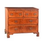 WALNUT CHEST OF DRAWERS