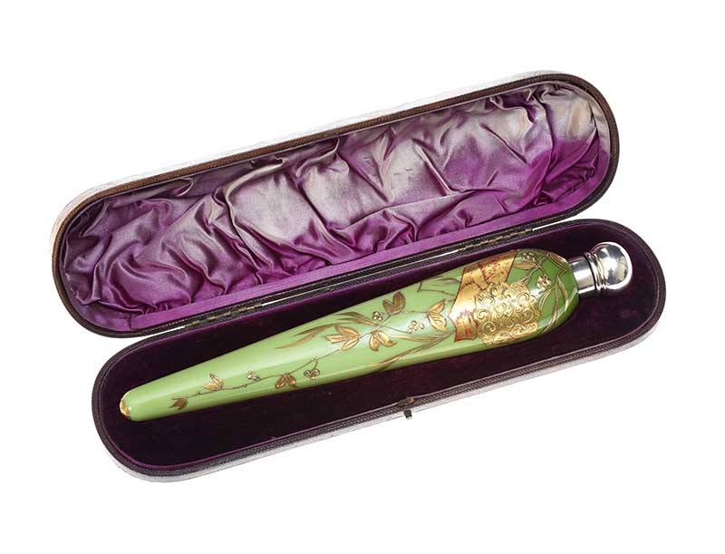 CASED PERFUME BOTTLE