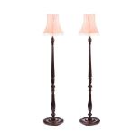 PAIR OF CARVED MAHOGANY STANDARD LAMPS