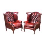 PAIR OF LEATHER WING BACK ARMCHAIRS