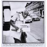 John Minihan - NEWSPAPER SELLER IN HAVANA, CUBA - Black & White Photograph - 10 x 10 inches -