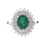 18CT WHITE GOLD EMERALD AND DIAMOND RING