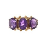 9CT GOLD THREE STONE AMETHYST DRESS RING