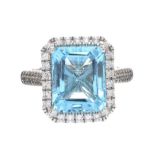 9CT WHITE GOLD BLUE TOPAZ AND DIAMOND RING