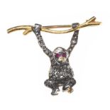 SILVER AND HIGH CARAT GOLD RUBY AND DIAMOND MONKEY BROOCH