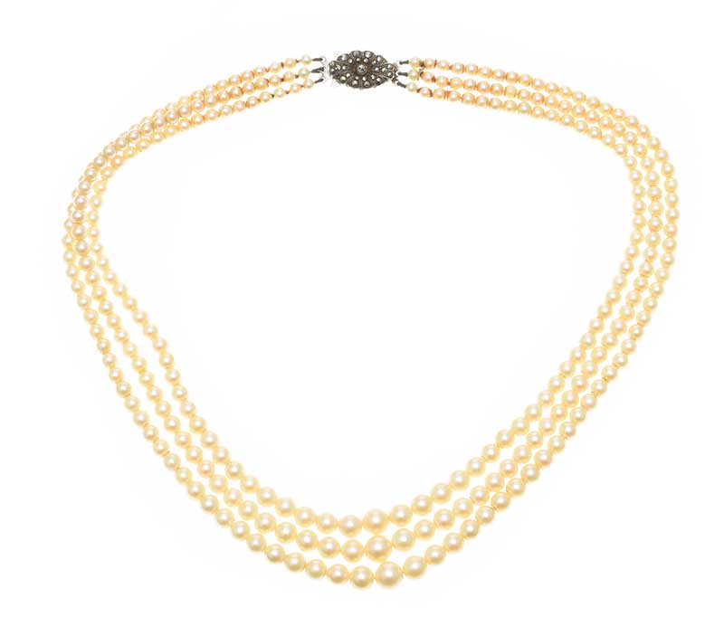 TRIPLE STRAND OF CULTURED PEARLS WITH SILVER AND MARCASITE CLASP