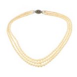 TRIPLE STRAND OF CULTURED PEARLS WITH SILVER AND MARCASITE CLASP