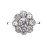 18CT WHITE GOLD DIAMOND DAISY CLUSTER RING