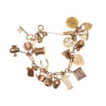 9CT GOLD CHARM BRACELET