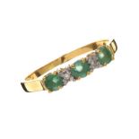 18CT GOLD EMERALD AND DIAMOND RING