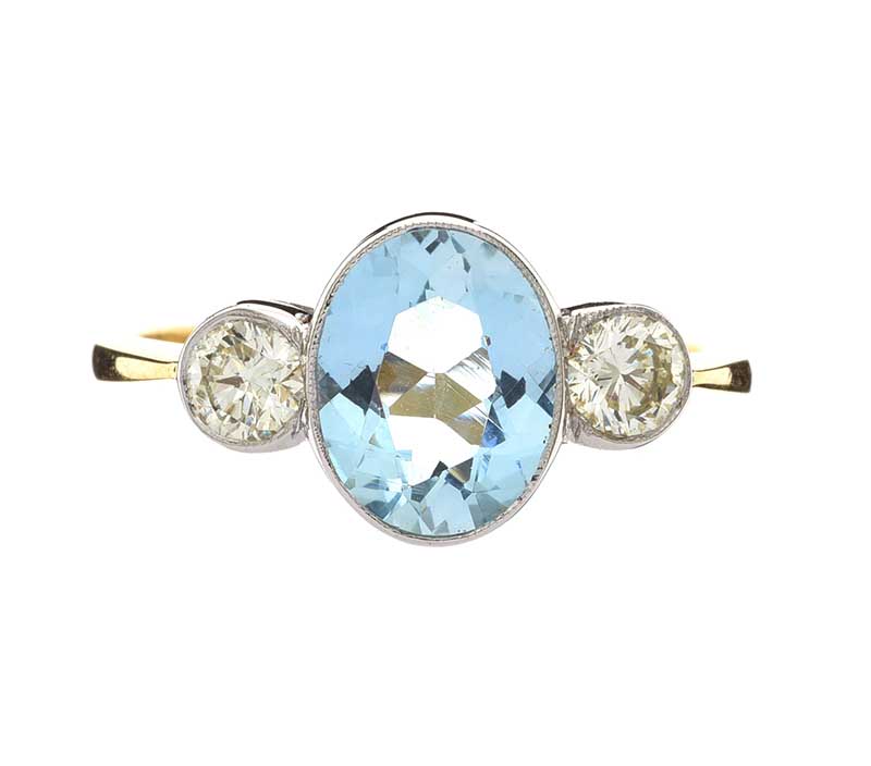 18CT GOLD AQUAMARINE AND DIAMOND RING