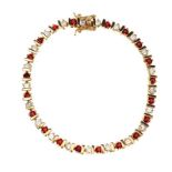 GOLD TONE CLEAR AND RED GLASS BRACELET
