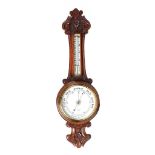 OAK CARVED ANEROID BAROMETER