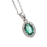 18CT WHITE GOLD EMERALD AND DIAMOND NECKLACE