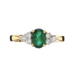 18CT GOLD EMERALD AND DIAMOND RING