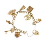 9CT GOLD CHARM BRACELET AND A LOOSE CHARM