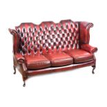 WINGED BACK LEATHER SETTEE