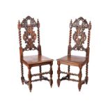 PAIR OF VICTORIAN CARVED OAK HALL CHAIRS