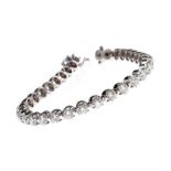 18CT WHITE GOLD DIAMOND TENNIS BRACELET