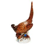 A Meissen porcelain figure group of a pheasant and chicks, c.1969, blue crossed swords marks,