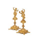 A pair of French gilt bronze models of musicians, late 19th/early 20th century, in the form of