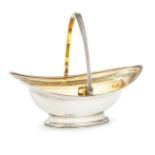 A George III silver and gilt swing handled bowl, London c.1795, Alexander Field, of naiveté form,