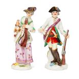 A pair of miniature Meissen porcelain models of a Hunter and Huntress, both circa. 1950's, blue