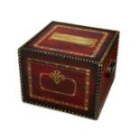 A red leather covered dispatch box, with gold tooling, iron handles and brass plaque to lid,