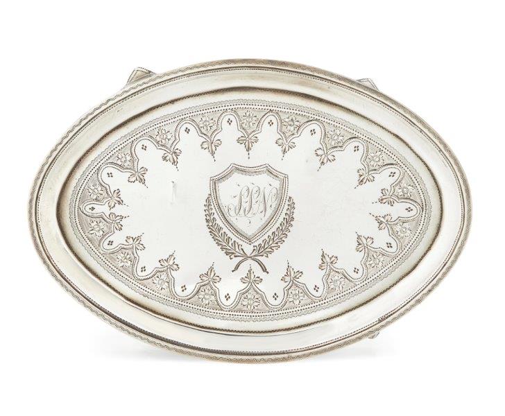 A George III silver teapot stand, London c.1795, Alexander Field, of oval form with engraved