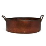 A large oval copper preserving pan, 19th century, with twin handles, engraved to the side Ring &