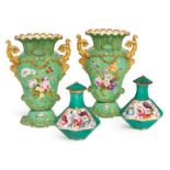 A pair of English porcelain twin handled green glazed vases, possibly Coalport, 19th century,