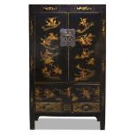 A Chinese black lacquer and parcel gilt wardrobe, late Qing dynasty, decorated with Chinese warriors