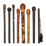 A collection of eight walking canes, 20th century, comprising two Japanese bamboo canes, two