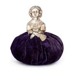 A silver novelty pin cushion in the form of a lady, Birmingham c.1911, Cornelius Desormeaux Saunders