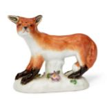 A Meissen porcelain model of a fox, circa 1955, blue crossed swords mark and incised marks for