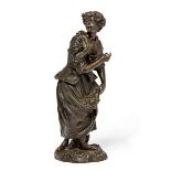 A Continental bronze model of a flower girl, late 19th century, the naturalistic base with