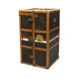 A Goyard steamer trunk, c.1900, leather bound chevron fabric with brass fittings, one strap