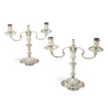 A pair of George II style two branch silver candelabra, 1961/62, J B Chatterley & Sons Ltd., with