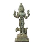 A bronze figure of Siva as Bhairava, Vijaynagara, 14th-15th century, on a tiered square base,