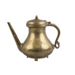 A Mughal brass ewer, India, 18th century, of squat form with faceted straight spout and curved s-