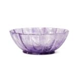 A Mughal amethyst lobed glass bowl, India, 19th century, of oval form, on short foot, 11.9cm. diam.