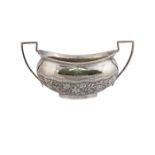 A silver sugar bowl with the monogram "MM" and stamped to the bottom "OM" (Oomersee Mawji), India,