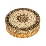 A painted ivory lidded box, Sri Lanka, 19th century, of round form, with fitted lid, painted to